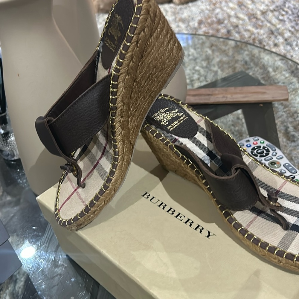 Burberry wedge thong sandal.